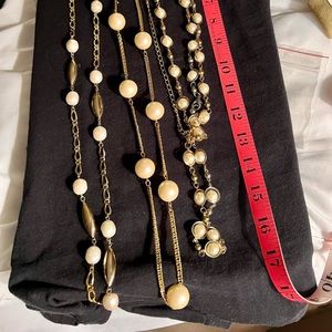 5 necklaces and 1 pair earrings